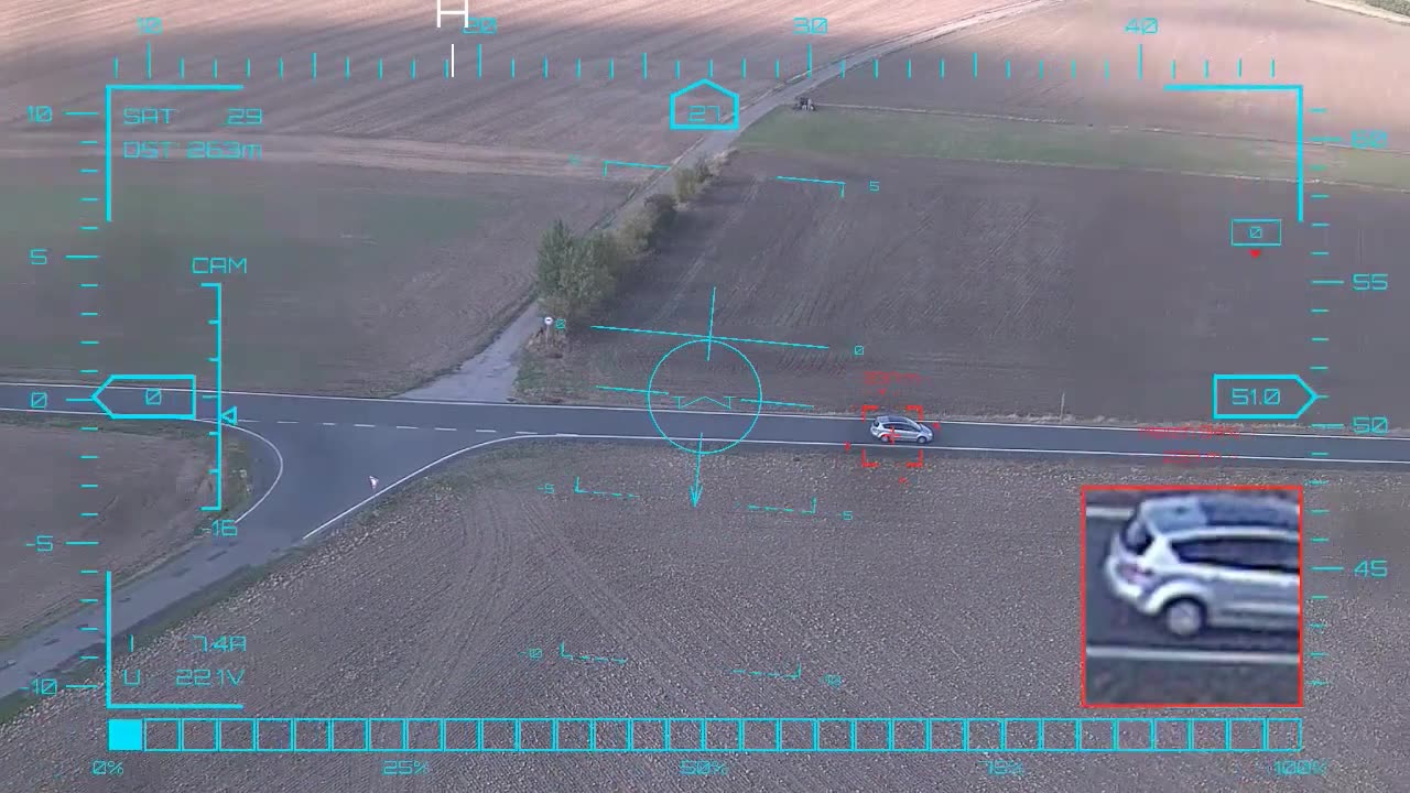 Silver crossover at the crossing — onboard AI target lock and real-time tracking from a UAV, FPV goggles DVR