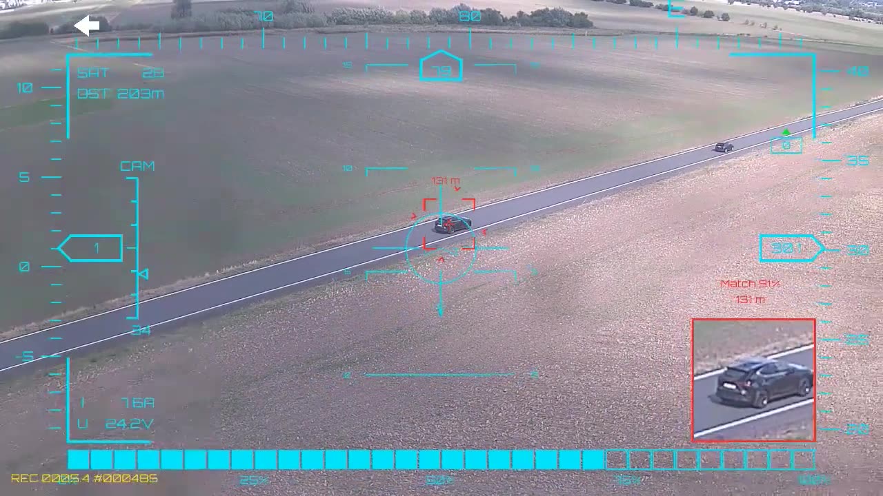 Dark car at the junction — onboard AI target lock and real-time tracking from a UAV, FPV goggles DVR